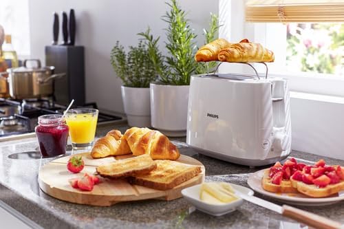 PHILIPS Eierkoker 3000-Serie Gezinsformaat 400 W Over dit item Maatbeker voor nauwkeurige resultaten: Afhankelijk van het soort ei dat u bereidt, heeft u verschillende hoeveelheden water nodig. De beker geeft de verschillende waterpeilmarkeringen aan voor