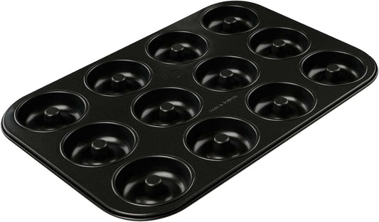 Dr. Oetker 12-delige donutbakvorm Gelijkmatig: met de donutvorm bak je 12 lekkere donuts of bagels in een handomdraai Innovatief: dankzij de gelijkmatige warmtegeleiding wordt een intensieve bruining van het gebakken voedsel gegarandeerd Inhoud: 1 x donut