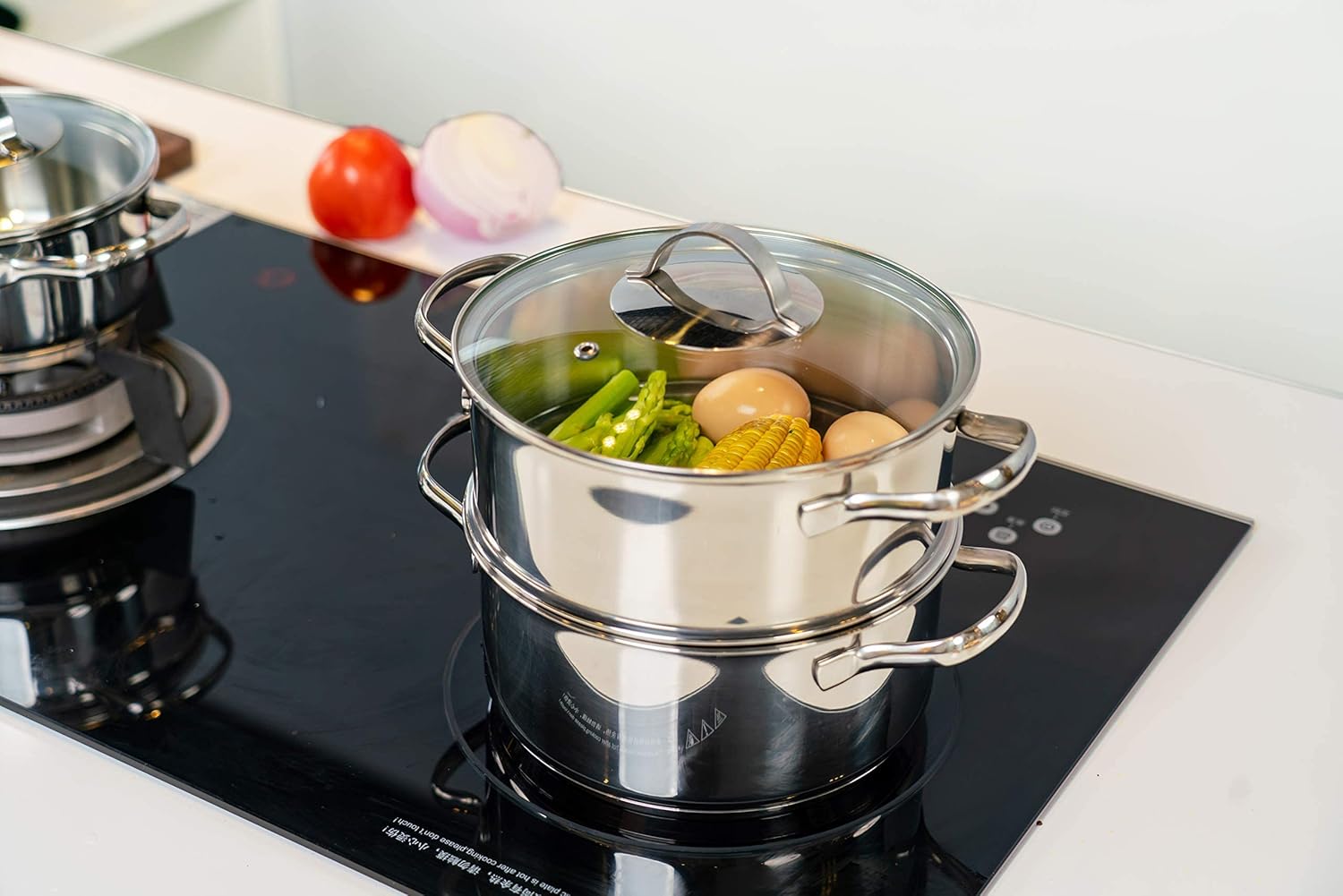 Basics Kookset, roestvrij staal, 15-delig, potten, pannen en kookgerei Over dit item De 15-delige set bestaat uit een koekenpan van 20,3 cm, een steelpan van 1,4 liter met deksel, een steelpan van 2,4 liter, een stoompan met deksel, een sauteerpan van 2,8