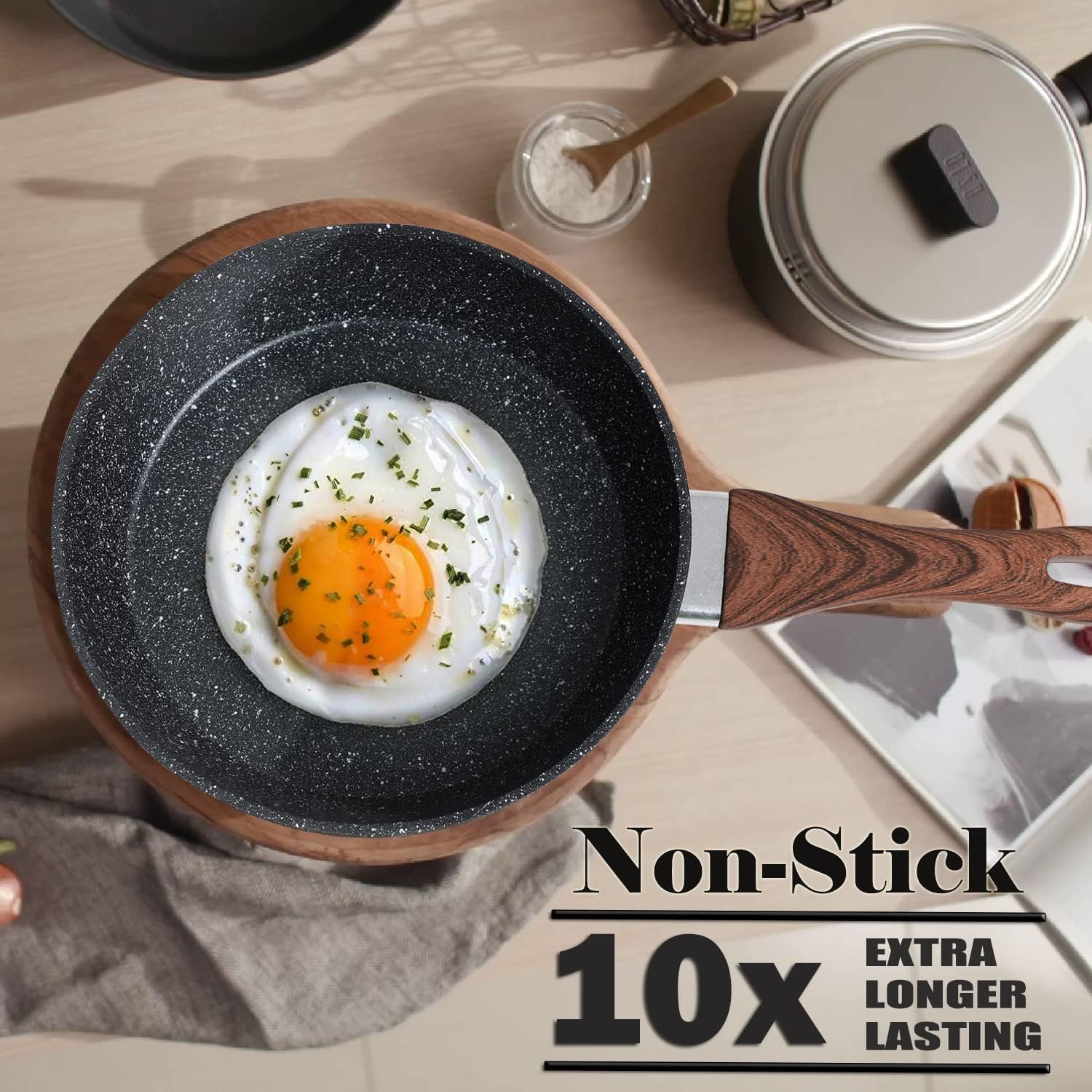 Kitchen Academy Inductie pannenset 12-delig, zwart graniet Afmetingen: 1 x pan 20 cm, 1 x pan 28 cm, 1 x koekenpan met deksel 24 cm/2,85 l, 1 x steelpan met deksel 17 cm/1,4 l, 1 x kookpan met deksel 20 cm/2,85 l, 1 x kookpan met deksel 24 cm/4,75 l, 1 x