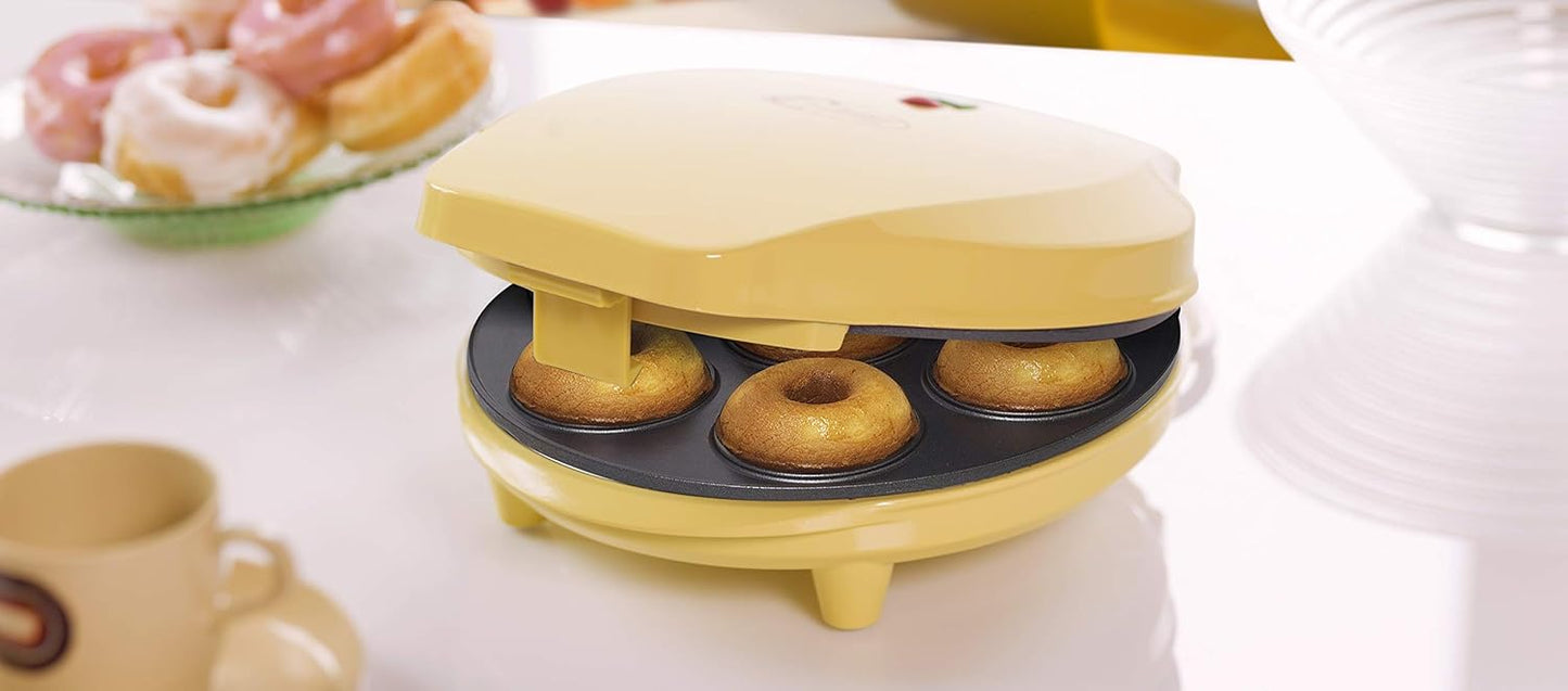 Bestron Donutmaker in retrodesign, antiaanbaklaag, 700 watt Over dit item Decoratieve donutmaker voor het bakken van 7 zoete of hartige bagels en donuts aan tafel — ideaal voor brunch of koffietijd samen Automatische temperatuurregeling voor een optimale