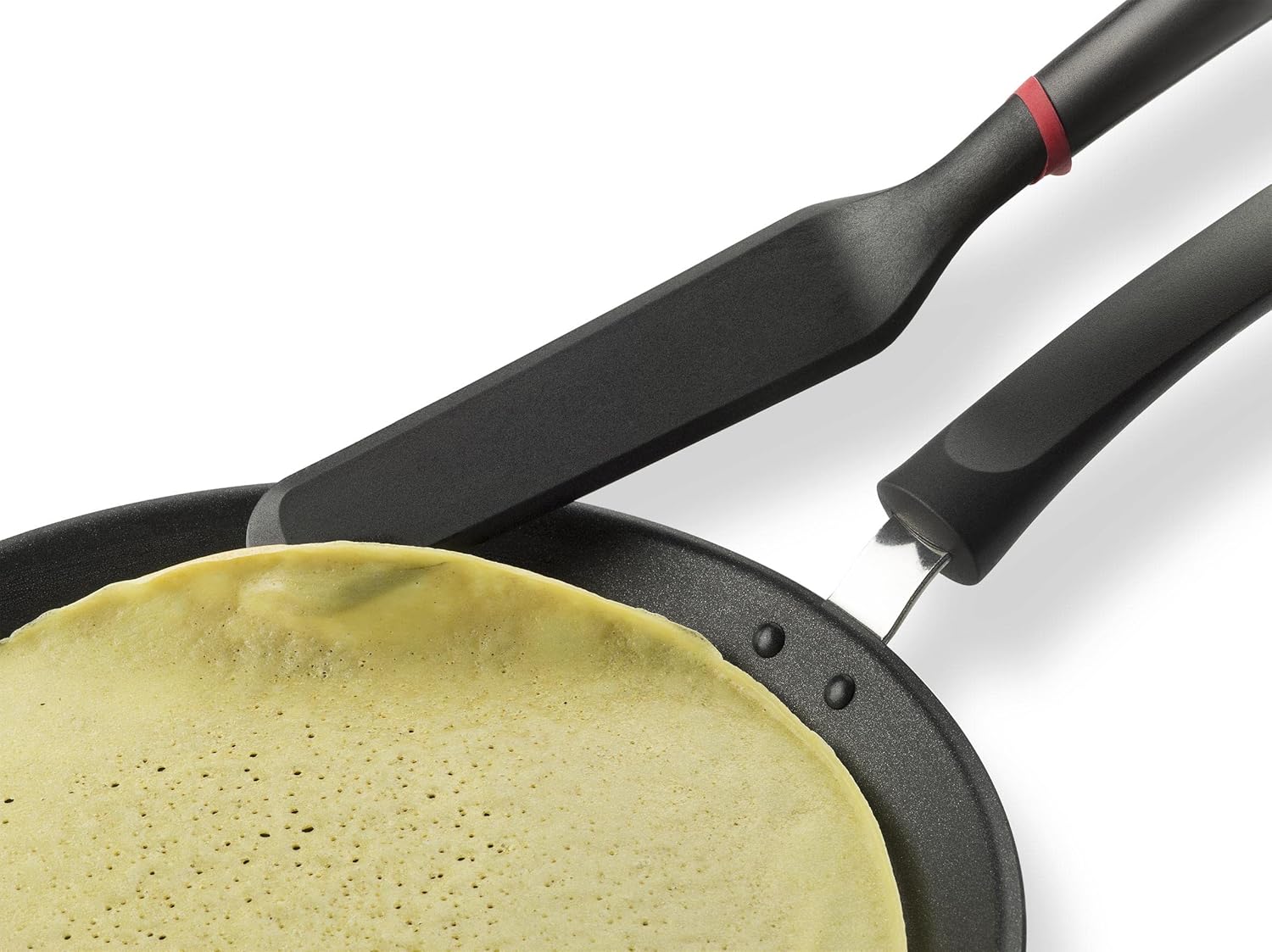 Tefal Ingenio Pannenkoekspatel Over dit item Ideale pannenkoekspatel met dunne uiteinden die gemakkelijk onder alle pannenkoeken en omeletten glijden De verhoogde stand zorgt ervoor dat het deel van de spatel waarmee je kookt niet in contact komt met het