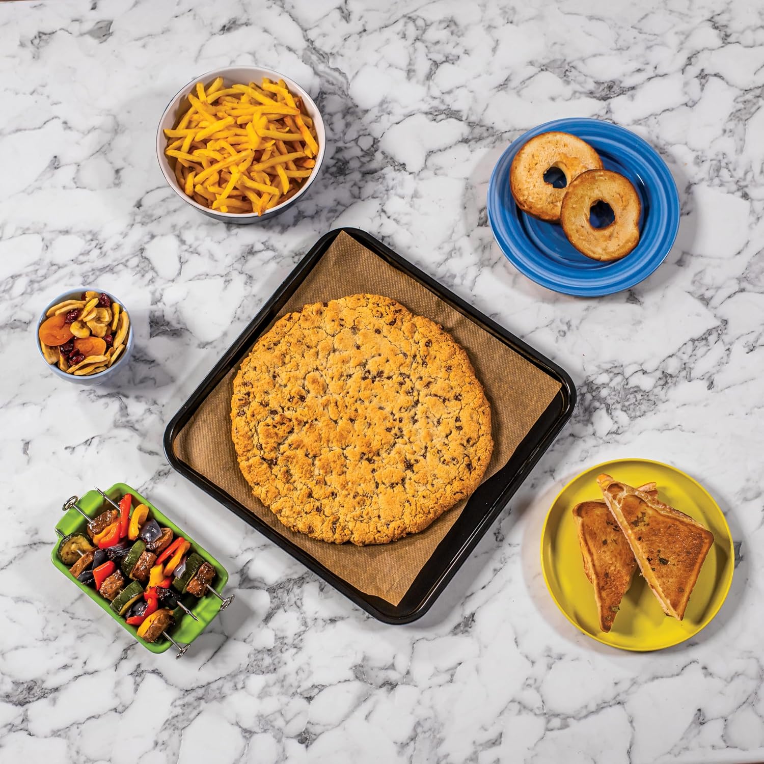 Ninja Foodi 10-in-1 Multifunctionele Oven VRIJSTAANDE OVEN MET GROTE CAPACITEIT: Snel en gelijkmatig koken op 2 niveaus. Er passen 2 pizza's tegelijk in of een hoofd- en bijgerecht. De True Surround Convection van de oven helpt voor snelle, krokante en ge
